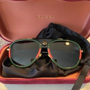 Gucci Aviator gold metal/black leather sunglasses